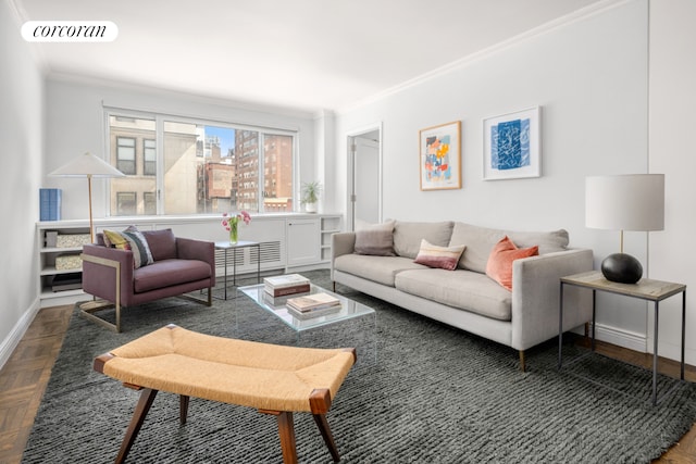 living room featuring crown molding and baseboards