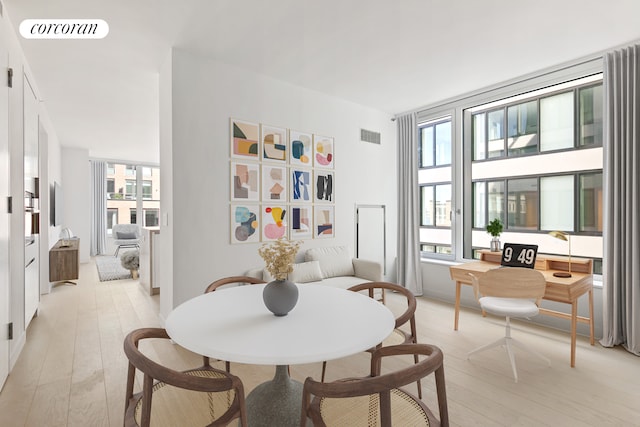 450 Washington St Unit 705, New York City, NY 10013 - dining area with healthy amount of natural light, light wood finished floors, and a desk