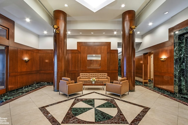 250 W 89th St Unit 8H, New York City, NY 10024 - lobby with a high ceiling, recessed lighting, and wood walls
