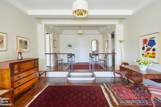living room featuring wood finished floors and arched walkways