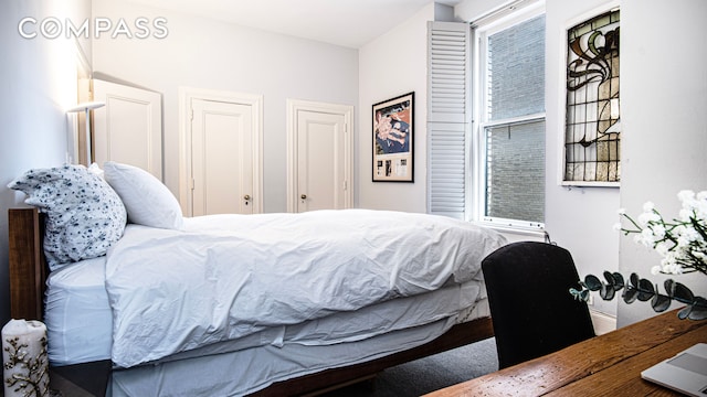 907 5th Ave Unit 4F, New York City, NY 10021 - bedroom featuring multiple windows