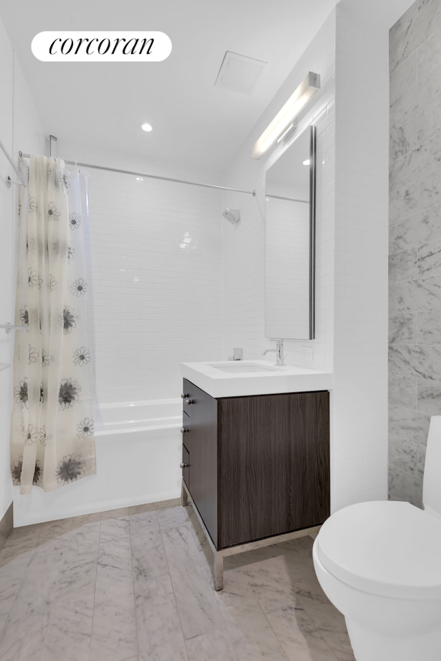 full bathroom featuring marble finish floors, shower / bathtub combination with curtain, vanity, toilet, and recessed lighting