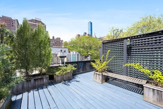 149 E 18th St Unit 2, New York City, NY 10003 - wooden deck featuring a view of city