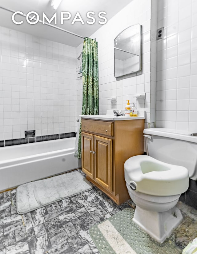 1274 Herkimer St, New York City, NY 11233 - full bathroom with tile walls, toilet, vanity, and shower / bathtub combination with curtain