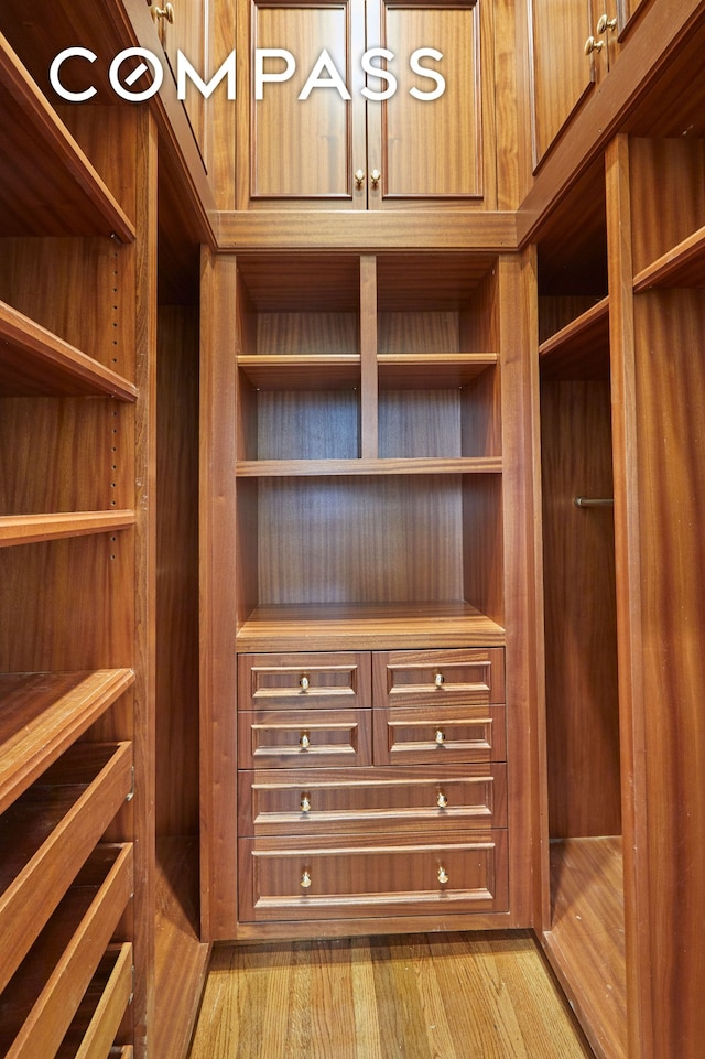 157 E 75th St Unit 1E, New York City, NY 10021 - spacious closet featuring light wood-style flooring