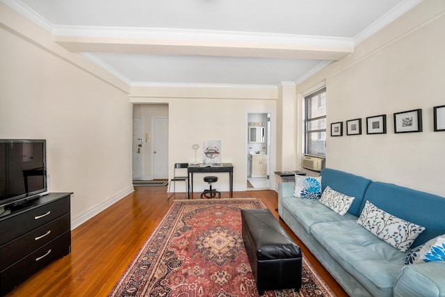 living area with wood finished floors, crown molding, baseboards, and cooling unit