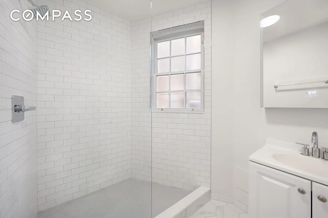 151 W 80th St Unit 4F, New York City, NY 10024 - full bath with vanity, tiled shower, and marble look tiles