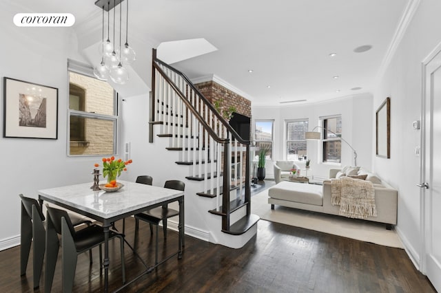dining room with crown molding, stairs, wood finished floors, baseboards, and recessed lighting