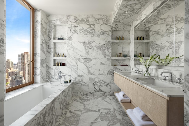 full bathroom featuring a garden tub, a view of city, marble tiled flooring, tile walls, and double vanity