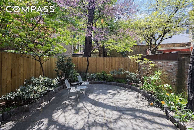 view of patio with a fenced backyard