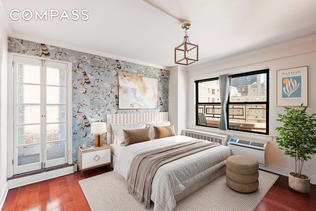 210 E 36th St Phc, Phc, New York City, NY 10016 - bedroom featuring radiator, ornamental molding, hardwood / wood-style flooring, wallpapered walls, and baseboards