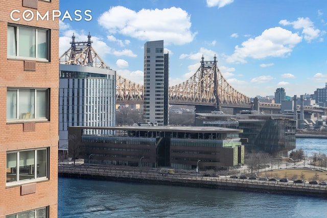 45 Sutton Pl S Unit 16B, New York City, NY 10022 - view of city featuring a large body of water and a notable bridge