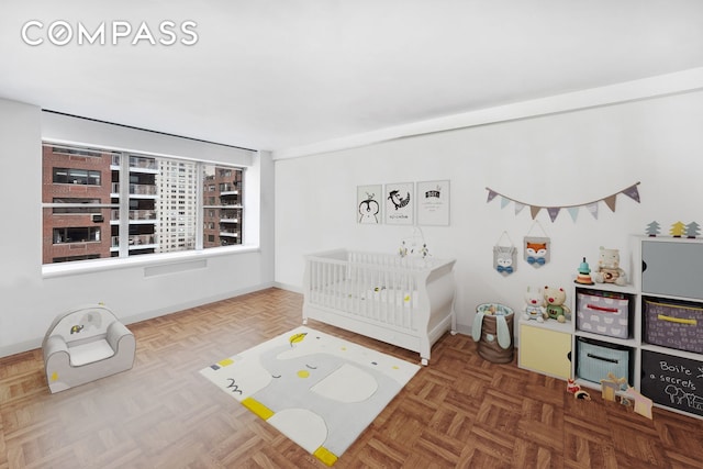bedroom featuring baseboards