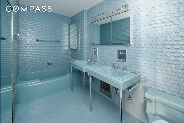 45 Sutton Pl S Unit 16B, New York City, NY 10022 - bathroom with tile patterned flooring and shower / bathtub combination