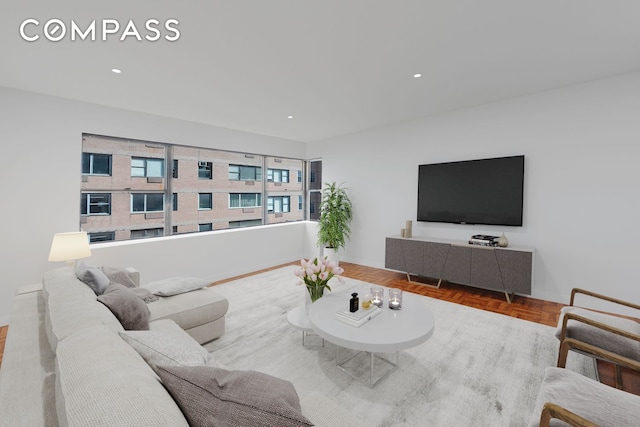 living area featuring recessed lighting