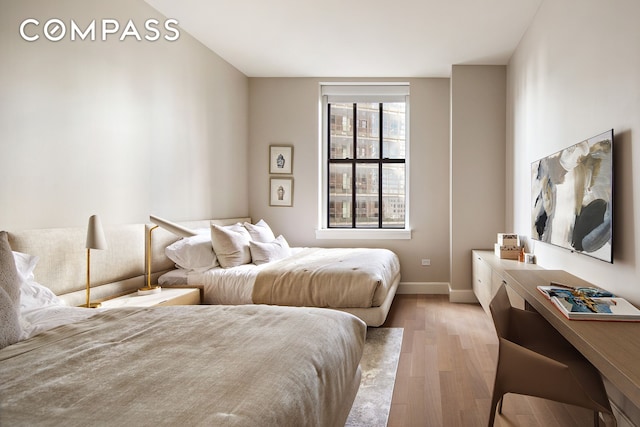 100 Barclay St Unit 20D, New York City, NY 10007 - bedroom featuring light wood-style floors and baseboards