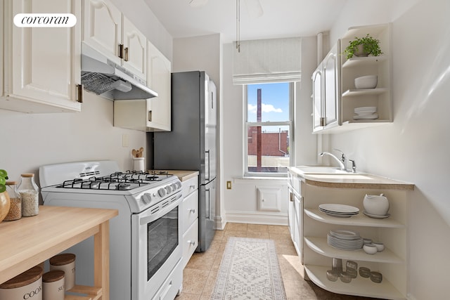 728 41st St Unit 3C, New York City, NY 11232 - kitchen with white gas range oven, open shelves, under cabinet range hood, and white cabinets
