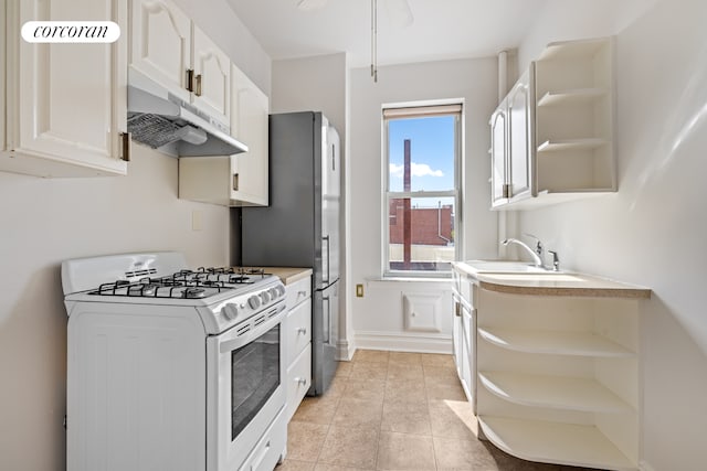 728 41st St Unit 3C, New York City, NY 11232 - kitchen featuring white range with gas stovetop, open shelves, under cabinet range hood, and a sink