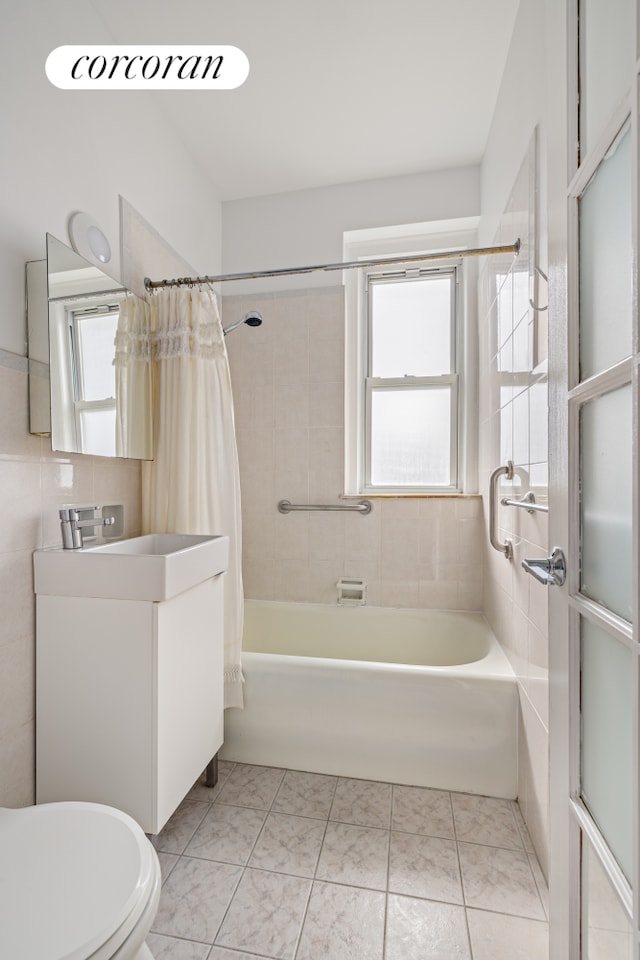 728 41st St Unit 3C, New York City, NY 11232 - full bathroom featuring toilet, shower / bath combination with curtain, and vanity