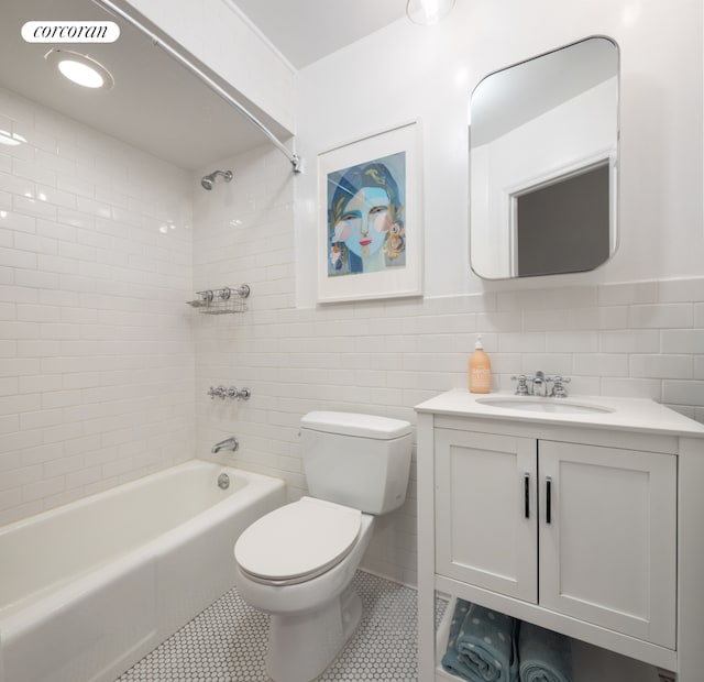 157 Kane St Unit 3, New York City, NY 11231 - full bathroom with toilet,  shower combination, vanity, tile walls, and tile patterned floors