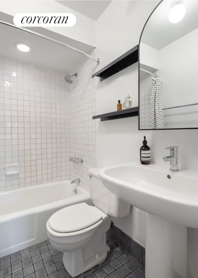 157 Kane St Unit 3, New York City, NY 11231 - full bathroom featuring tile patterned floors, shower / bath combo with shower curtain, toilet, and a sink