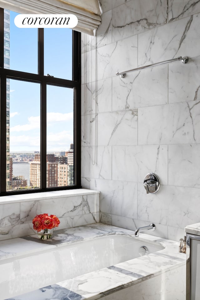 100 Barclay St Unit 20B, New York City, NY 10007 - bathroom with a city view and vanity