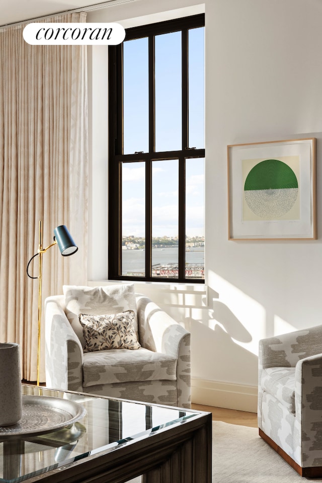 100 Barclay St Unit 20B, New York City, NY 10007 - living area with baseboards and wood finished floors