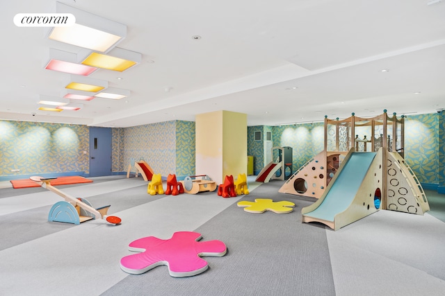 100 Barclay St Unit 20B, New York City, NY 10007 - playroom featuring wallpapered walls and carpet floors