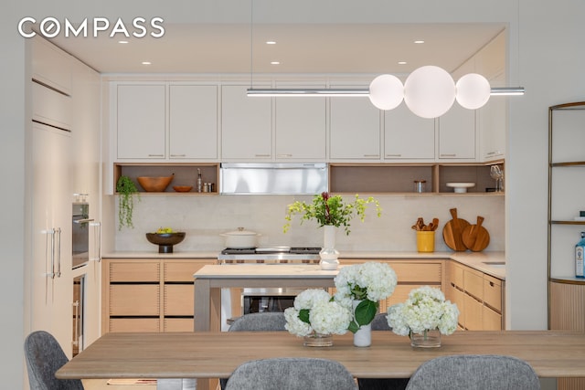 250 W 96th St Unit 6A, New York City, NY 10025 - kitchen with open shelves, ventilation hood, white cabinets, tasteful backsplash, and recessed lighting