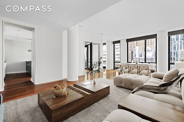 101 Warren St Unit 11L, New York City, NY 10007 - living area featuring wood finished floors and baseboards