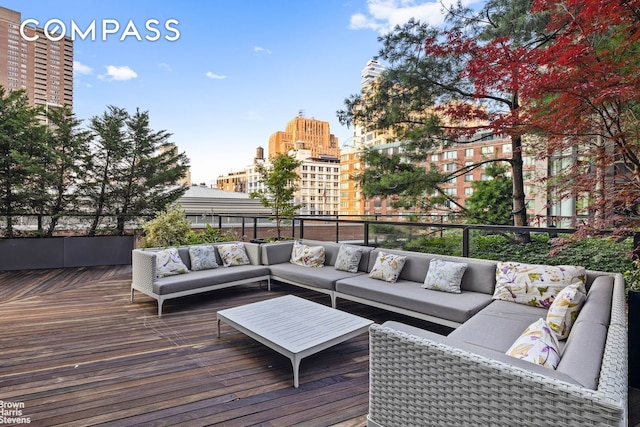 101 Warren St Unit 11L, New York City, NY 10007 - wooden deck featuring outdoor lounge area and a city view