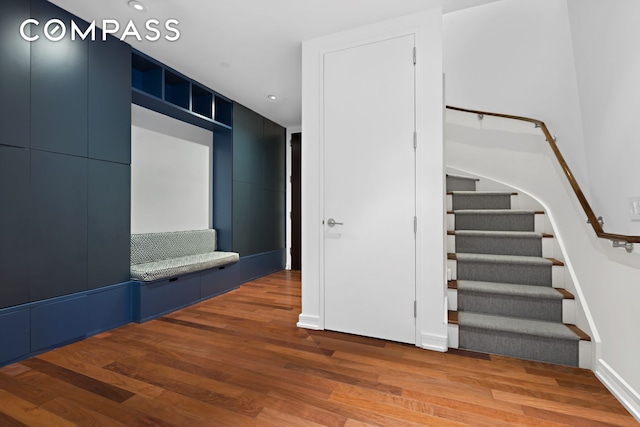 101 Warren St Unit 11L, New York City, NY 10007 - stairway featuring wood finished floors, recessed lighting, and baseboards