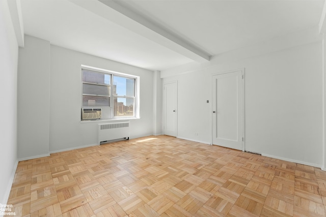 500 Grand St Unit C11A, New York City, NY 10002 - unfurnished room with radiator, baseboards, and cooling unit