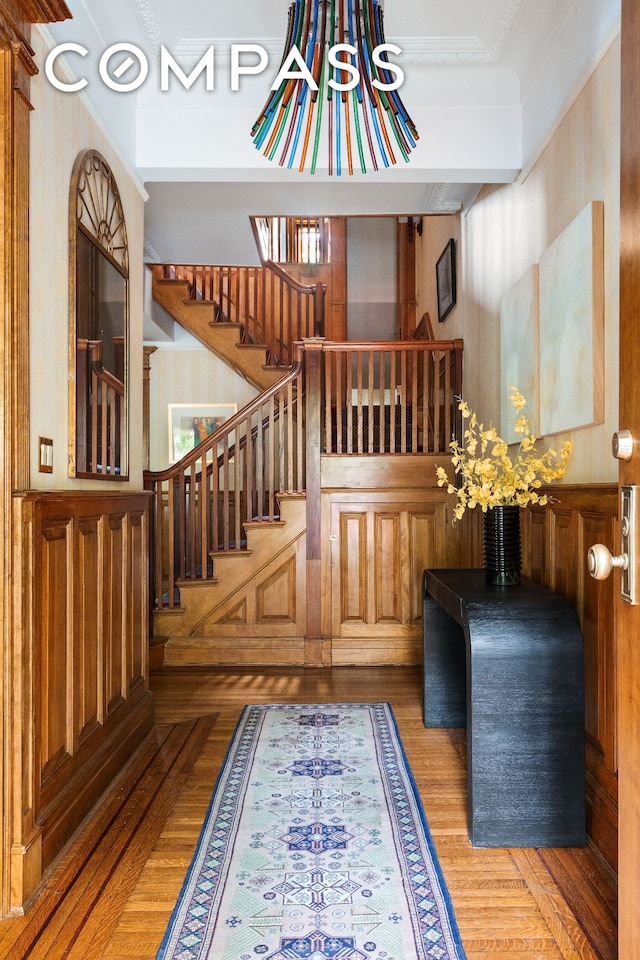623 2nd St, New York City, NY 11215 - stairway with wood finished floors and ornamental molding