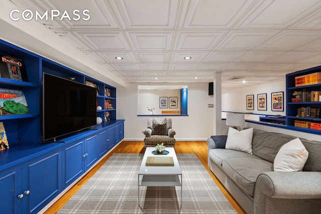 623 2nd St, New York City, NY 11215 - living area featuring recessed lighting, an ornate ceiling, light wood-style flooring, and baseboards
