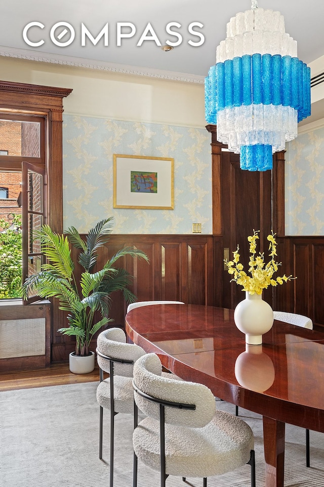 623 2nd St, New York City, NY 11215 - dining room with wallpapered walls and a wainscoted wall