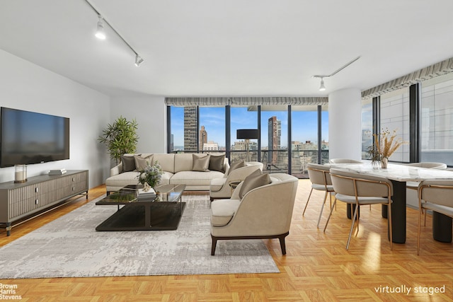 161 W 61st St Unit 33F, New York City, NY 10023 - living area featuring rail lighting and a view of city