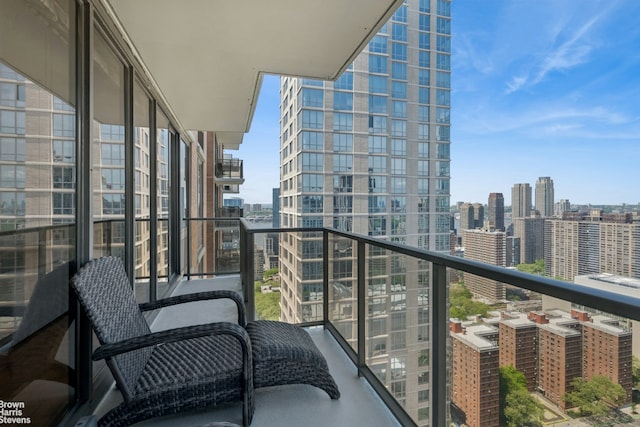 balcony featuring a view of city