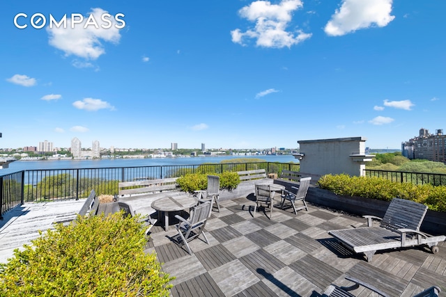 67 Riverside Dr Unit 1A, New York City, NY 10024 - view of patio featuring a water view, outdoor dining area, and a view of city