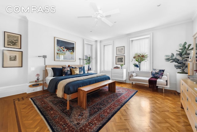bedroom with ornamental molding, baseboards, and a ceiling fan