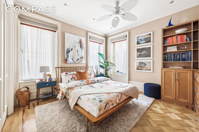 bedroom featuring crown molding and a ceiling fan