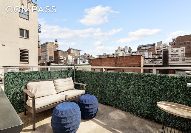 50 W 15th St Unit 7E, New York City, NY 10011 - view of patio featuring an outdoor hangout area and a city view