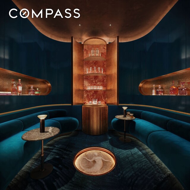 bar area featuring carpet