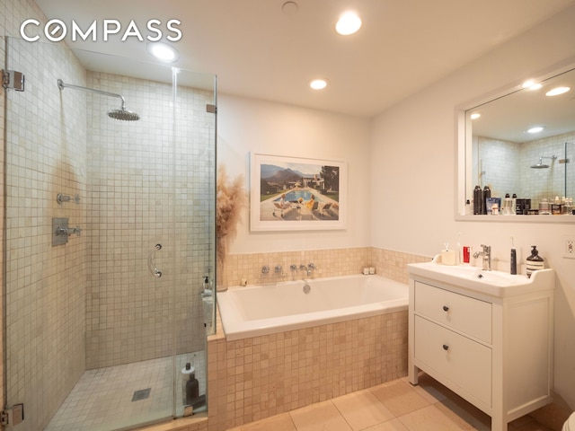 84 Front St Unit 5E, New York City, NY 11201 - full bathroom featuring tile patterned flooring, a stall shower, a garden tub, vanity, and recessed lighting