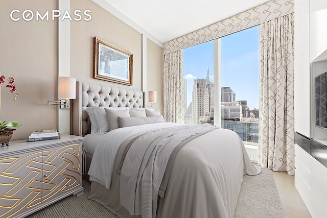 bedroom with a view of skyline