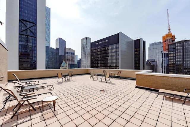 58 W 58th St Unit 11A, New York City, NY 10019 - view of patio / terrace featuring a view of city