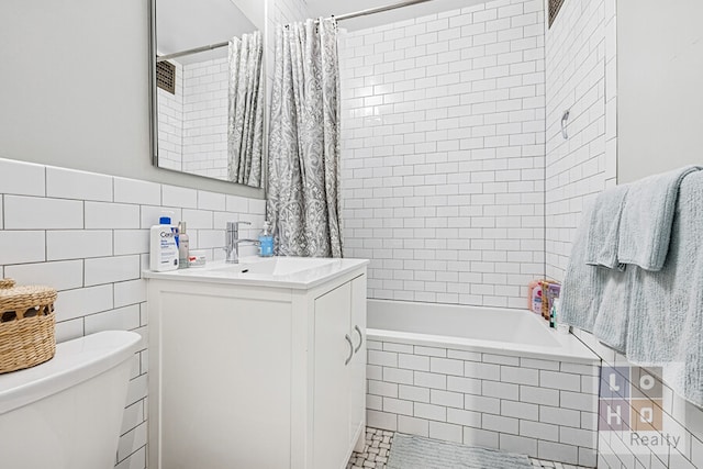455 Fdr Dr Unit B405, New York City, NY 10002 - bathroom with tile walls, vanity, and tiled shower / bath combo