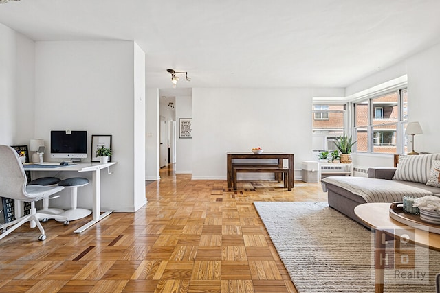 455 Fdr Dr Unit B405, New York City, NY 10002 - living area featuring a desk and baseboards