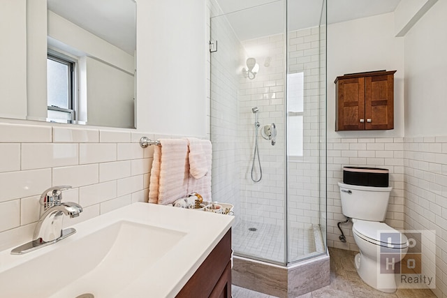 455 Fdr Dr Unit B405, New York City, NY 10002 - bathroom featuring tile walls, a shower stall, and vanity