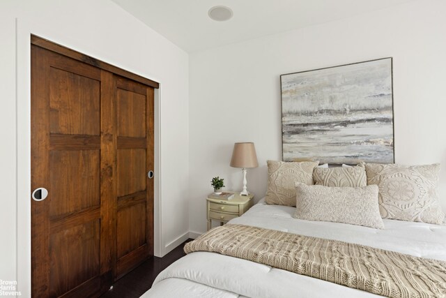 357 Dean St Unit 4A, New York City, NY 11217 - bedroom with baseboards and dark wood-type flooring